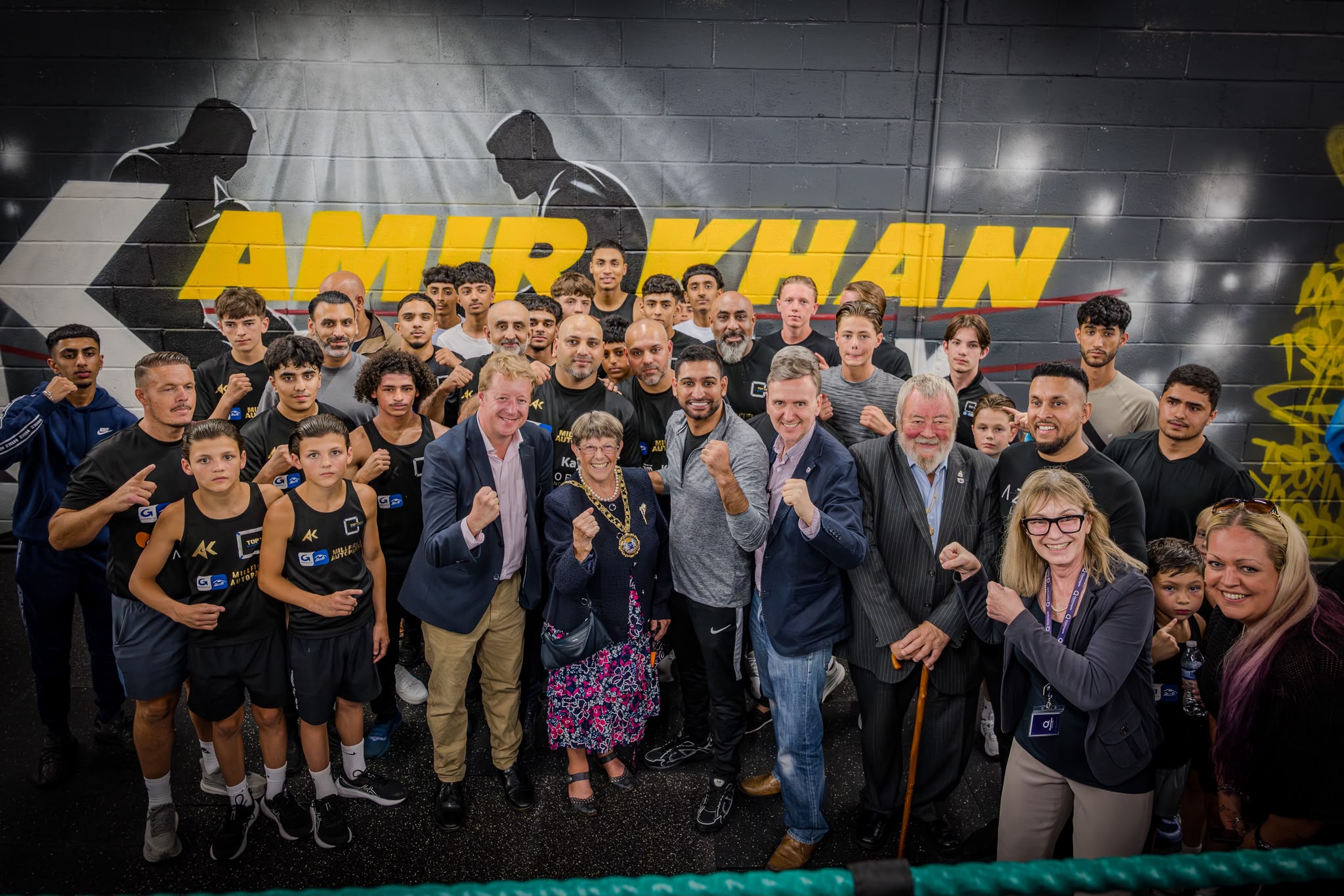 Amir Khan with Top Yard boxers, coaches and community guests at the Peterborough academy